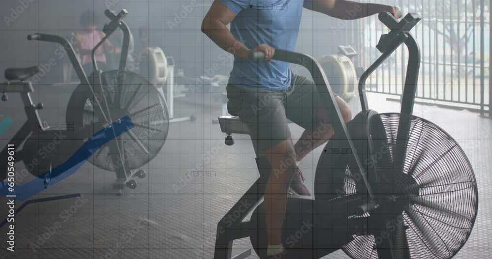 Aufkleber animation of graph processing data over caucasian man cross training on elliptical at gym