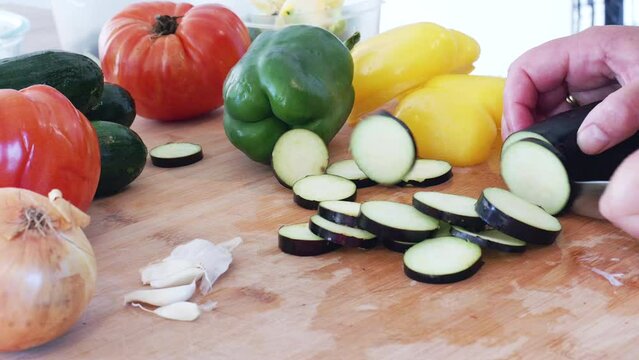 Chopping vegetables on a cutting board