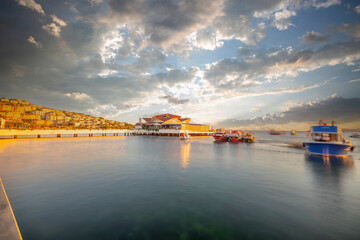 Fototapeta na wymiar Istanbul Buyukcekmece beach sunset and boats