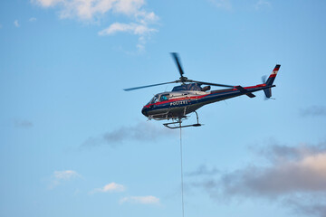Helicopter rescue team training simulation. Austria police division - obrazy, fototapety, plakaty