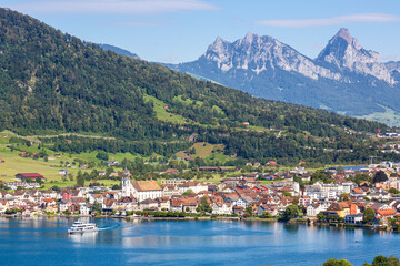 Naklejka na ściany i meble Arth at lake Zug in the Swiss Alps mountains with Kleiner and Grosser Mythen mountain peaks in Switzerland