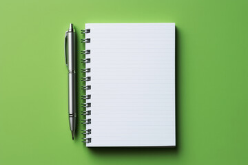 notebook and pen over green background, top view. Generative Ai - Powered by Adobe