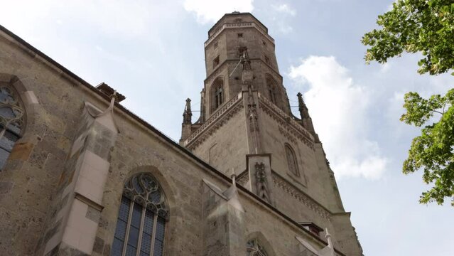 A View Of St. George's Church With Tower Daniel In N&ouml;rdlingen, Bavaria, Germany. Low Angle