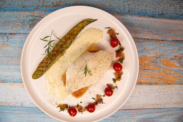 FISH RECIPE, SAINT-PIERRE SEAFISH, FILLET ACCOMPANIED BY PANNE RICE, THAI AUBERGINE, TOMATO,...