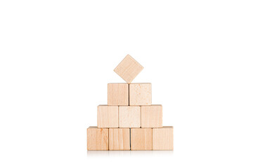 wooden cubes in the form of a pyramid on an isolate white background