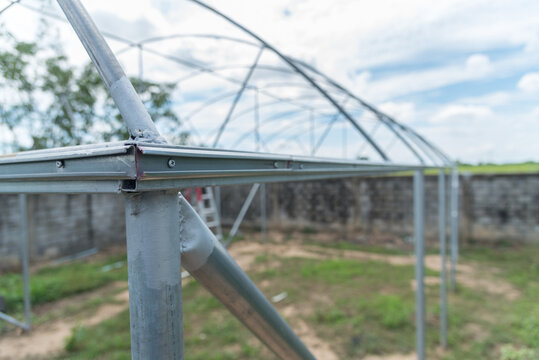 Closeup focus to  Channel Wire Lock to greenhouse