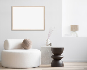 Blank picture frame mockup on white wall. Modern living room design. View of scandinavian style interior with artwork mock up on wall. Home staging and minimalism concept