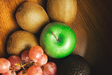bold fruit grapes kiwis apple