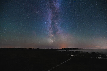 Night scene at the Seli swamp.  Milky Way pillar over a small lake.