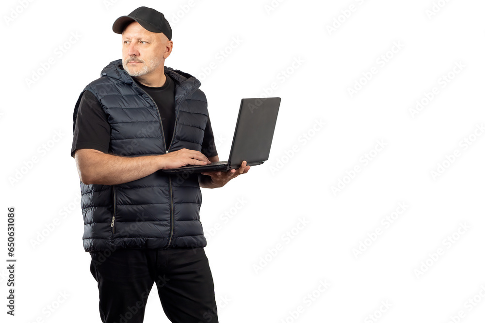 Poster man with laptop. guy is standing with computer in his hands. male in black clothes prints text. man 