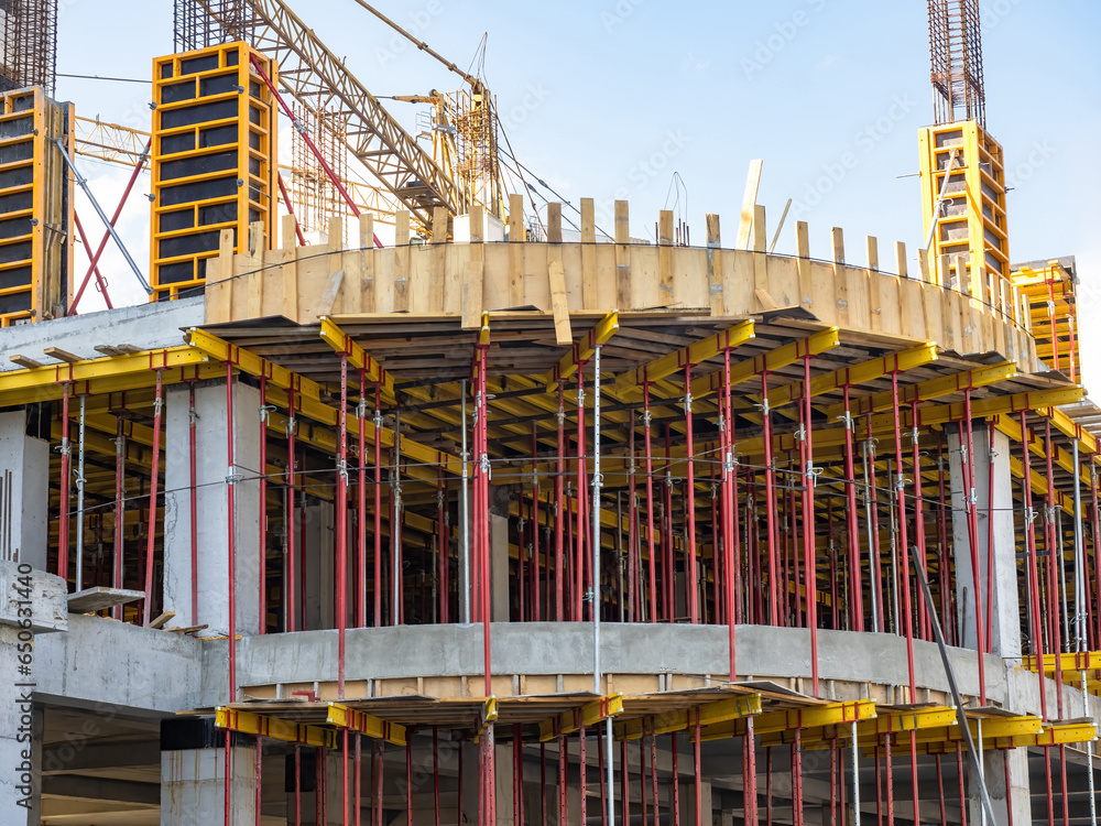 Poster building construction. frame monolithic unfinished house. building under construction with temporary