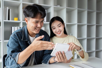 financial in family concept, Happy Asian husband and wife calculating income to plan for investment