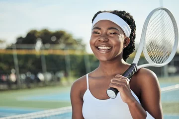 Tapeten Happy black woman, tennis and professional on court with racket ready for match, game or outdoor sport. Face of African female person, athlete or sports player smile for fitness, practice or training © peopleimages.com