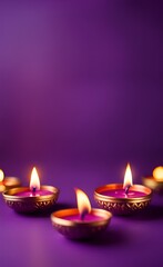 Obraz na płótnie Canvas Elegant happy diwali festival with diwali diya on purple background.