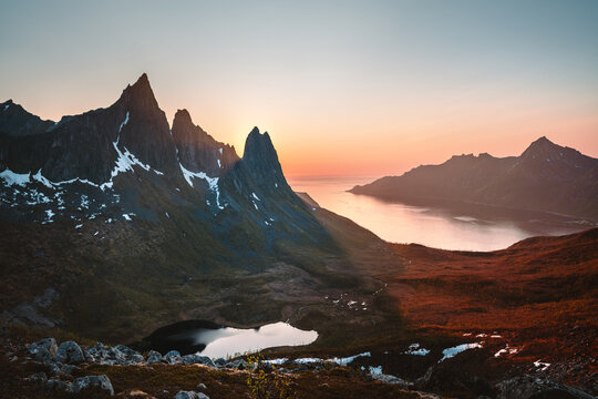 Senja island mountains landscape in Norway midnight sun view travel beautiful destinations sunset scenery scandinavian nature 