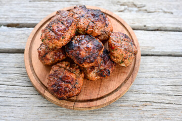 Home made  fried pork meatballs  outdoor on wooden rustic background