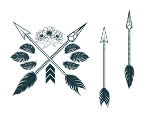 Indian arrows with feathers and flowers. Hand drawn ethnic design elements in boho style. Vector illustration for tattoo, web design, t-shirts and print.