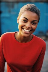 Portrait of a black young woman in red sweater