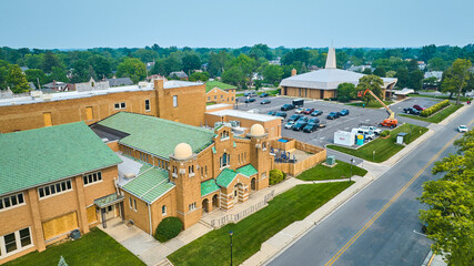 Aerial St Jude Catholic school and church with school windows under construction