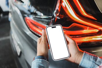 Phone with isolated screen on the background of a car