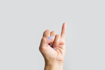 hand showing the gesture with raised up his pinky - obrazy, fototapety, plakaty