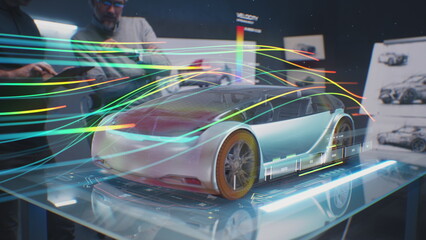 Two automotive engineers check aerodynamics of new electric car using futuristic augmented reality...