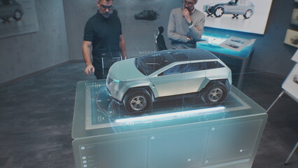 Two male automotive designers create body of new electric car using futuristic virtual reality...