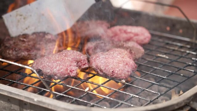 Grilling burgers at tailgate 