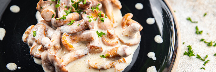 chanterelle julienne mushroom cream sauce appetizer meal food snack on the table copy space food background rustic top view 