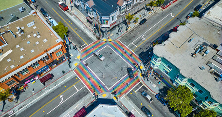 Rainbow crosswalks in Castro District aerial downward view with shops - obrazy, fototapety, plakaty