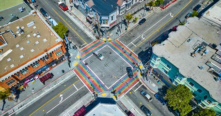 Poster Rainbow crosswalks in Castro District aerial downward view with shops © Nicholas J. Klein