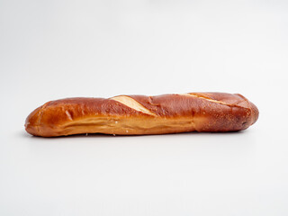 Pretzel on a white background. Bakery pretzel close-up.