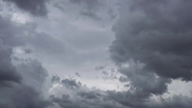 Time lapse Dark gray thunderclouds. Dramatic sky. lighting in the dark, Overcast