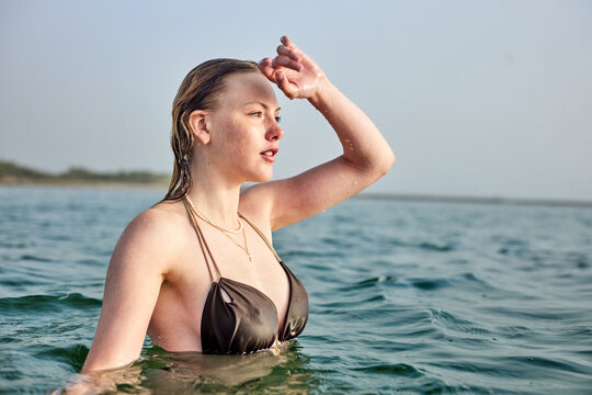 danish girl walking on the beach