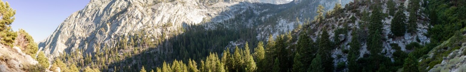 Panorama view of white valley of granide mountains with conifers on Mount Whitey, California, usa