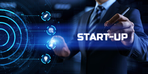 Startup new business idea. Businessman pressing button on screen.