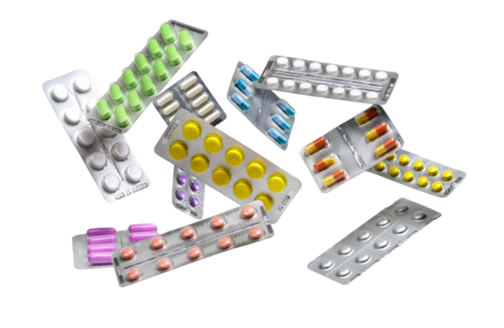 A lot of colorful medicine pills and capsules in blister packs flying on white background