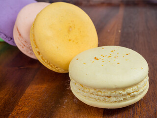colorful macaroon on a wooden tray