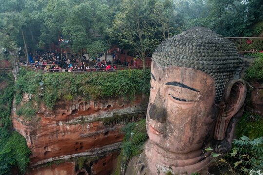 Discover the colossal Leshan Giant Buddha, a 71-meter stone statue in Sichuan, China, a UNESCO World Heritage Site.