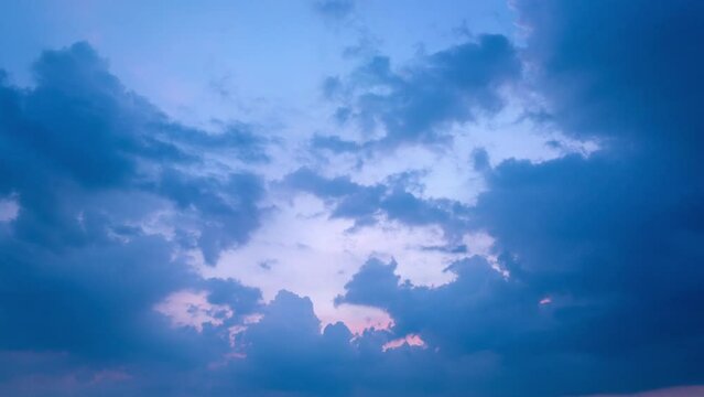 ..aerial hyper lapse view blue cloud in sweet sky of sunset..Scene of romantic beautiful sky sunset with slow moving cloud in the sky background..Nature video High quality footage.Gradient color.