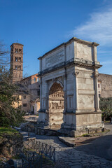 Fototapeta na wymiar Triumphal arch of Roman emperor Titus on Forum Romanum in Rome, Italy