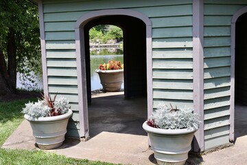 The door of the wood gazebo in the garden.
