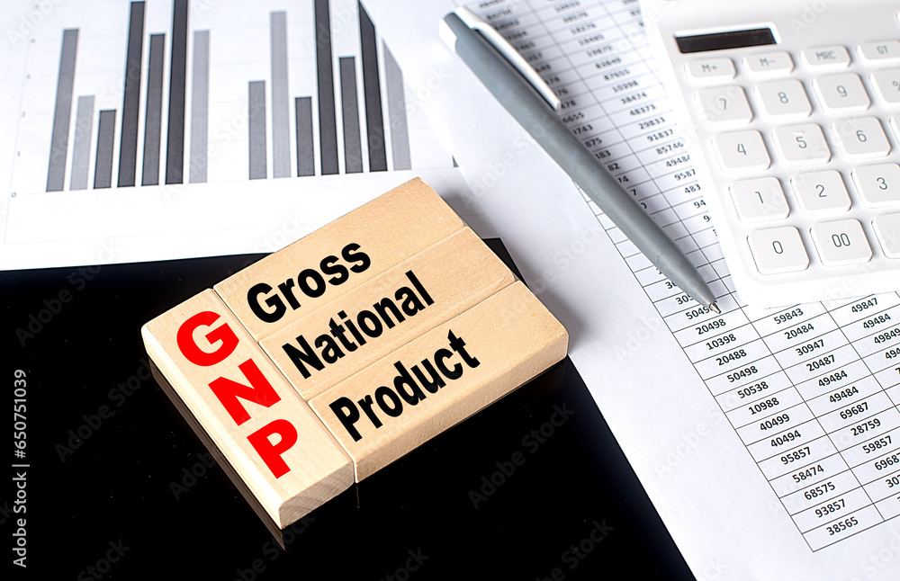 Poster word gnp made with wood building blocks with chart and calculator