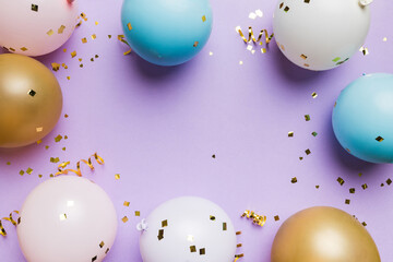 Flat lay party decoration concept on pastel colored background from above. Love concept. Holiday celebration. Valentine Day or birthday party decoration