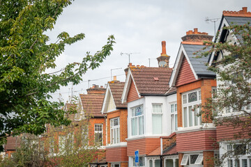Street of typical British residential family terrace houses in south west London