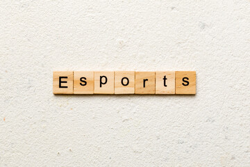 Esports word written on wood block. Esports text on cement table for your desing, Top view concept