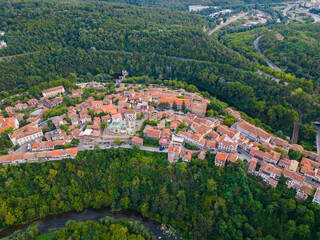 Fototapeta na wymiar An aerial view of Veliko Tarnovo reveals a Bulgarian city rich in history and culture, with its beautiful buildings, streets, and picturesque hills.