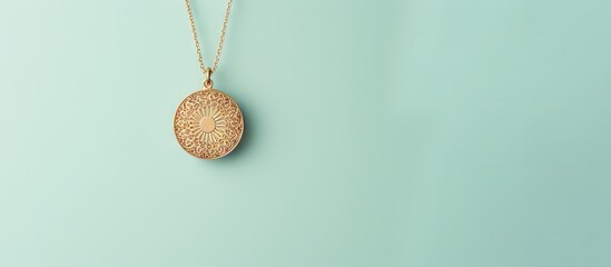 Close up of a isolated pastel background Copy space isolated jewelry gold pendant no chain - obrazy, fototapety, plakaty