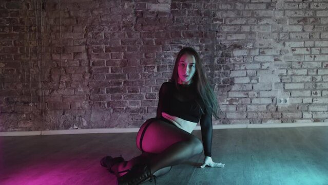 Sexy Girl Dancing On Floor In Neon Light