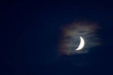 Obraz na płótnie Canvas A new moon on a calm night with clear sky